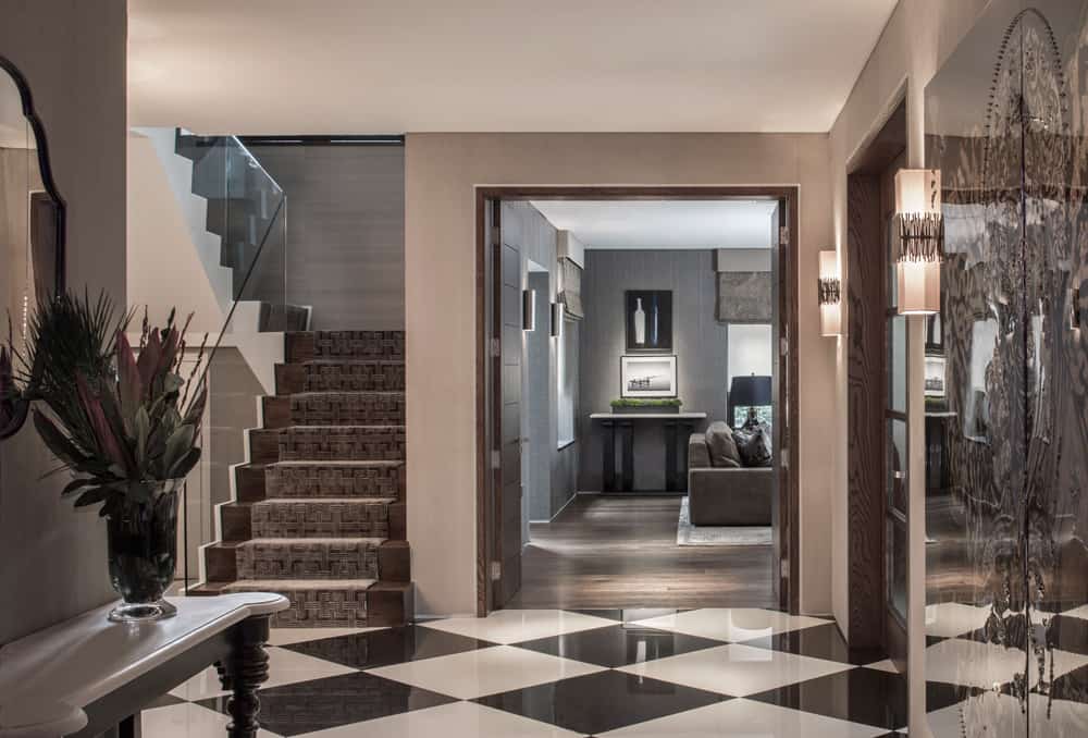 luxury entrance hall with black and white floor tiles